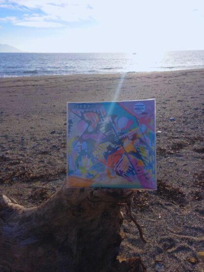 Vinyl record on the beach